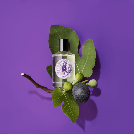 cologne bottle with fig branch